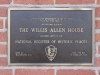 Historic home placard on front of home