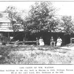 Log Cabin on West Main St. 1904